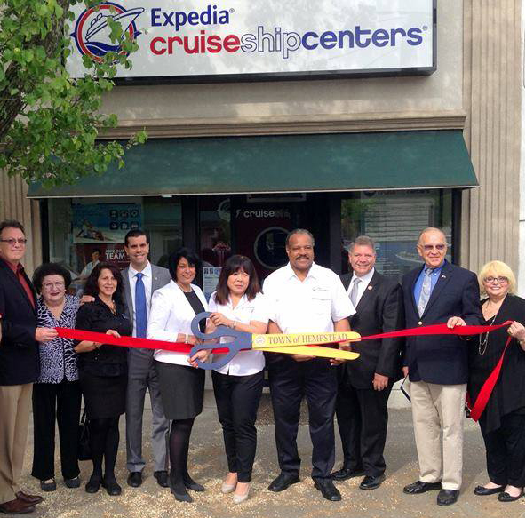 Franchise Partner Joyce Mariner, former NYPD Detective and her team at Expedia CruiseShipCenters in Merrick, NY celebrate the Grand Opening of their retail travel agency franchise.